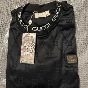 Gucci 2 piece set shirt and joggers.